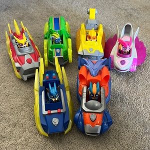 6 gently used Paw Patrol Mighty Pups vehicles and characters. Only used inside!!